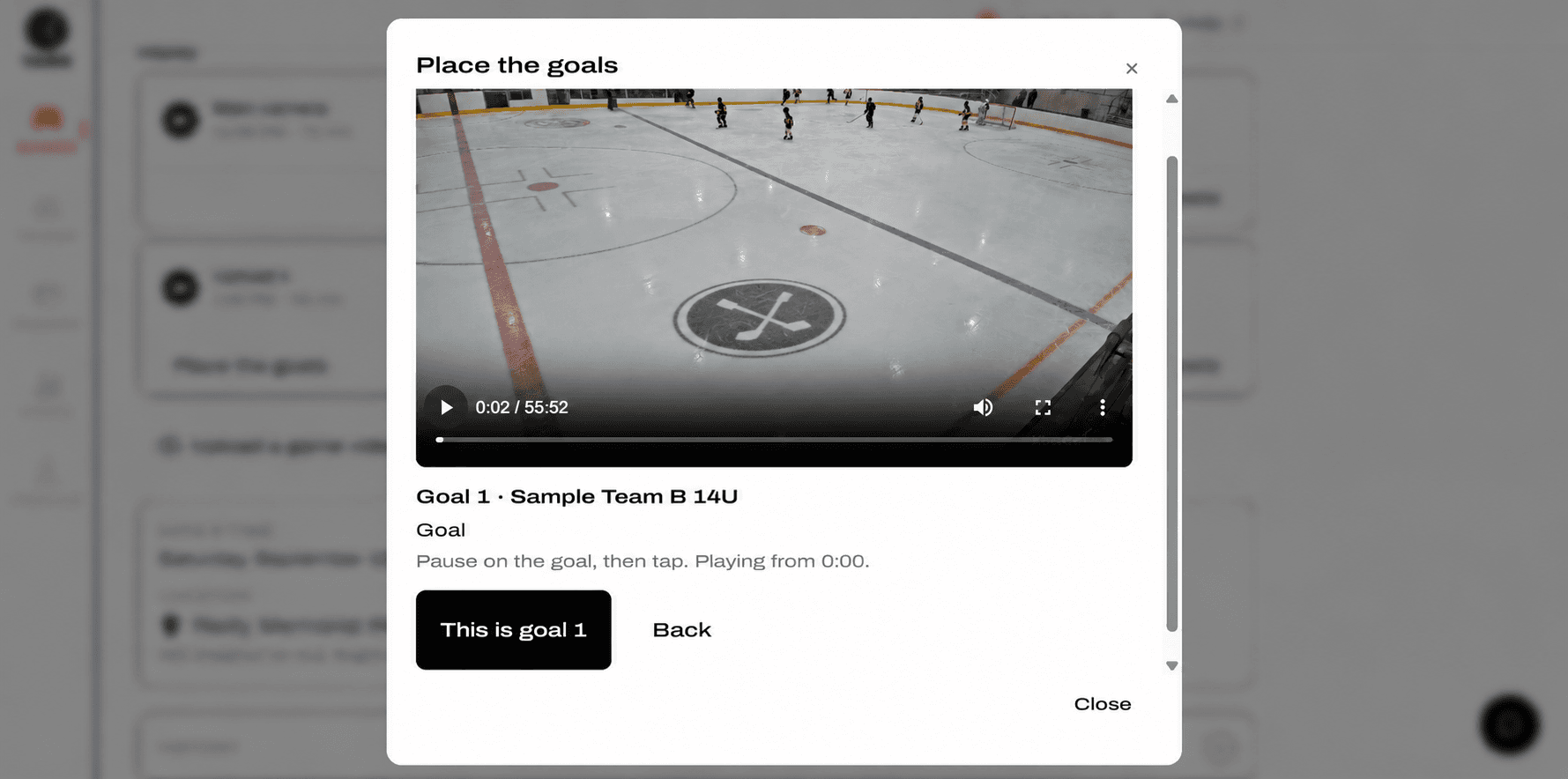 Placing goal 1: the video paused on the play, with This is goal 1 and Back buttons below it